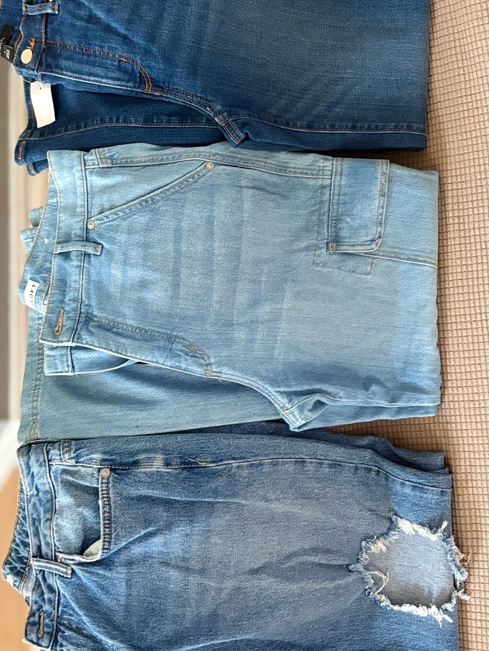 2 pair of gently used jeans 1 pair of new jeans